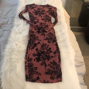 Pink and black form fitting dress. MIDI dress